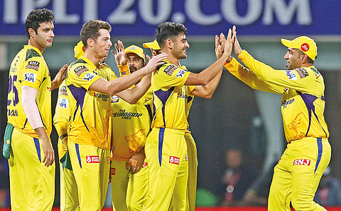 CSK celebrates the wicket of Ishan Kishan.