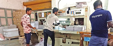 Workers in action at a printing unit in Sivakasi, Virudhunagar district