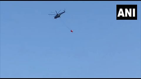 Helicopters deployed to douse the flames (Image credits: ANI)