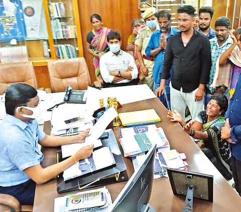 Thangamani?s family members submitting a petition to Tiruvannamalai Collector B Murugesh on Friday