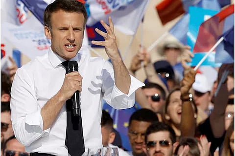 French President Emmanuel Macron speaks during a campaign rally,