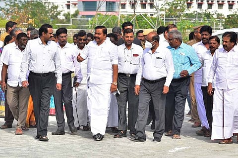 Minister KN Nehru inspecting the site for the integrated bus stand at Panchapur in Tiruchy on Saturday