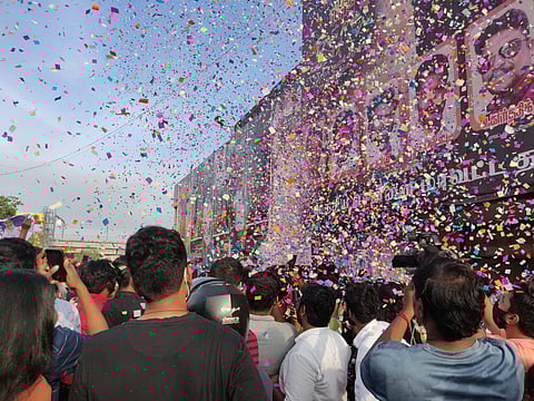 Fans celebrating beast outside theatre