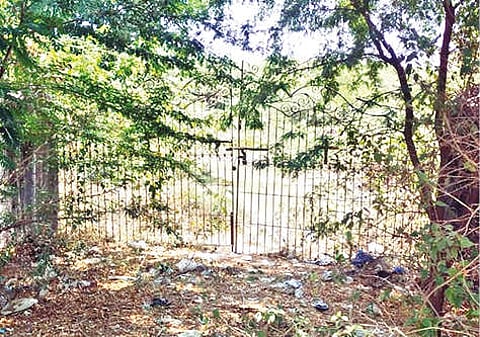 The compound wall raised by a private party