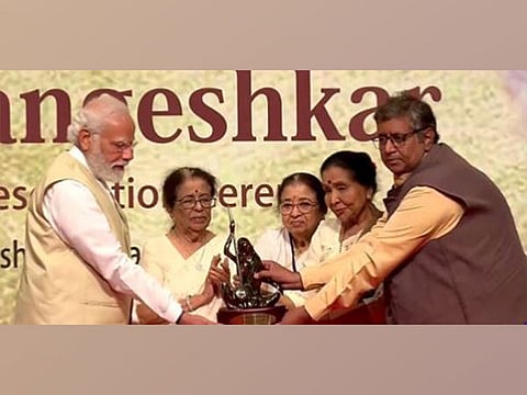 PM Narendra Modi receiving the Lata Deenanath Mangeshkar Award in Mumbai.