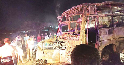 The mangled remains of the burnt car and mini-bus in Tirupur district on Saturday