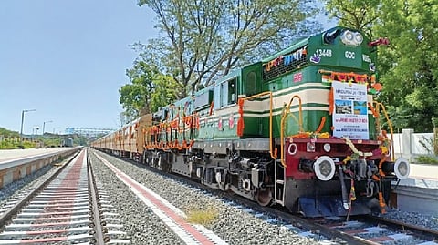 The resumed Madurai-Bodi train on newly laid broad gauge track chugging into Bodinayakanur station.