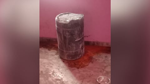The plastic drum in which the deceased mother was kept