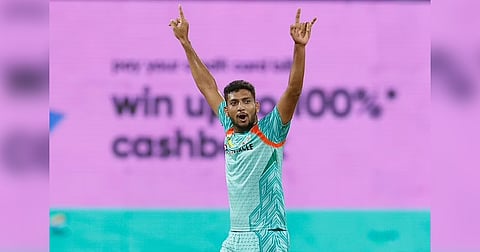 Mohsin Khan taking a wicket