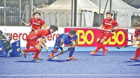 Action during India-Japan match