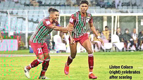 Liston Colaco (rights) after scoring