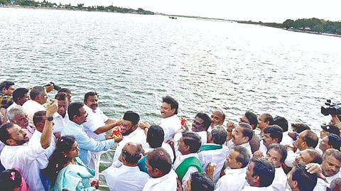 Ministers KN Nehru and Anbil Mahesh Poyyamozhi inspect the flow at Kallanai in Tiruchy on Friday