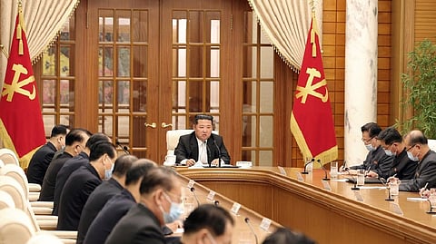 North Korean leader Kim Jong Un chairs a Worker's Party meeting on coronavirus disease (COVID-19) outbreak response in this undated photo released by North Korea's Korean Central News Agency (KCNA) on May 12, 2022