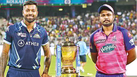 GT captain Hardik Pandya and RR captain Sanju Samson with the IPL trophy