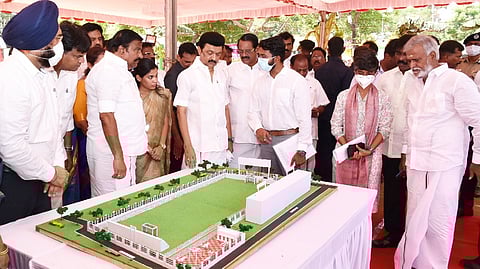 Stalin looking at the miniature of the playground