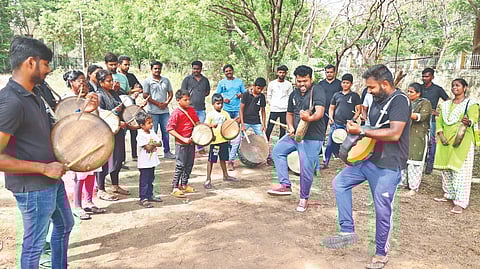 Sakthi with the attendees of a one-day parai camp in Chennai