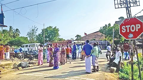 Relatives of the deceased girl staging a road blockade in Tiruchy on Monday