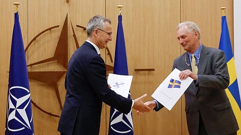 NATO Secretary-General Jens Stoltenberg and Sweden's Ambassador