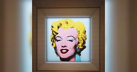 The painting, Shot Sage Blue Marilyn, was painted by Warhol in 1964 using a famous photograph as inspiration.
