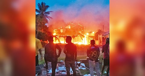 Anti-government demonstrators set fire to Minister Sanath Nishantha?s house on Monday