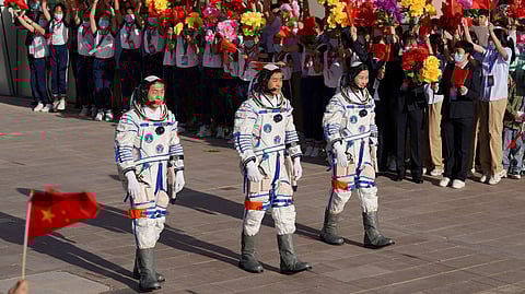 Chinese astronauts Chen Dong, Liu Yang and Cai Xuzhe