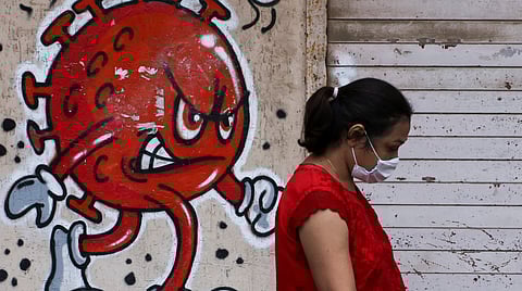 A wall painting of the virus