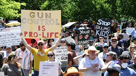 Biden signs gun law; enhanced background checks for young buyers