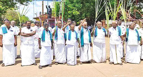 Sugarcane farmers staging protest for arrears in Thanjavur on Saturday
