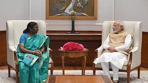PM Narendra Modi and presidential candidate Droupadi Murmu