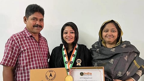 Najiya Navas with her parents