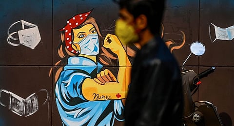 A man wearing a facemask as a preventive measure against the Covid-19