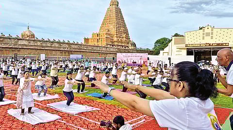 MoS for Education Annapurna Devi (in chudidhar) in action at a yoga day event near Big Temple on Tuesday