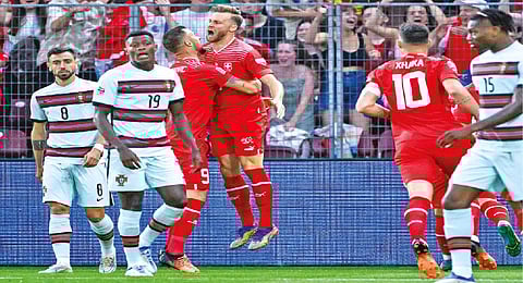 Haris Seferovic (fourth from left) celebrates after scoring the winning goal