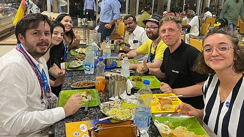 Geert van der Velde at the restaurant eating from a vaazha ilai (plantain leaf)