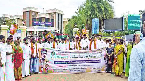 BJP members staging a protest in front of the Collectorate in Thanjavur on Monday