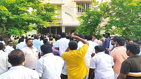AIADMK cadre staging a protest in front of former minister R Kamaraj?s house in Mannargudi on Friday