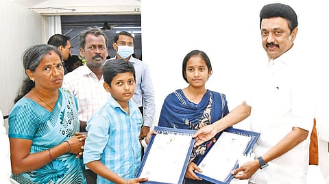 Chief Minister MK Stalin handed over community certificates to two tribal children.