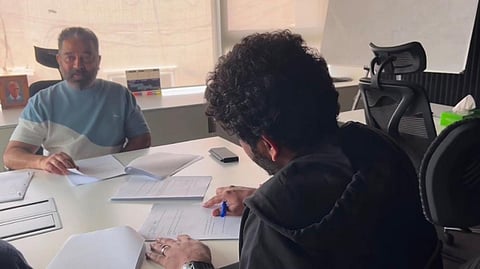 Director Vignesh Shivan with Kamal Haasan