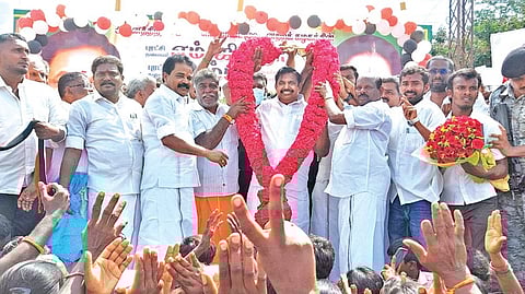 AIADMK interim general secretary Edappadi K Palaniswami being garlanded by party cadre in Salem on Friday.