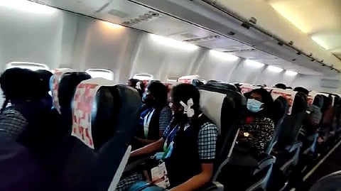 Sky is not the limit: Children enjoy the aerial view from the special flight.