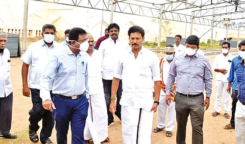 Anbil Mahesh Poyyamozhi inspecting upcoming stalls for the book fair at Thanjavur Palace premises on Saturday