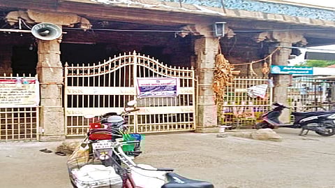 The closed Amma Mandapam ghat with warning banner in Tiruchy on Monday