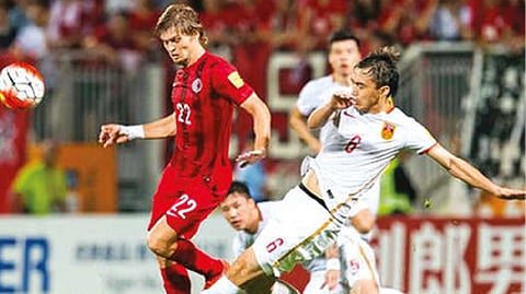 Football match between Hong Kong and China