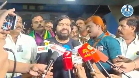 Actor-filmmaker T Rajendar talking to reporters at Chennai airport.