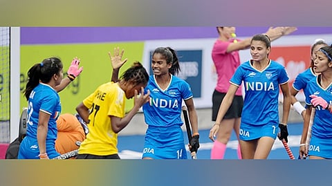 Indian women's hockey team celebrating.