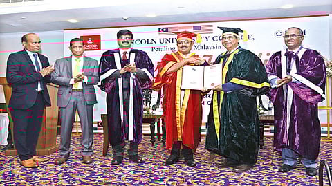 LUC president Prof Dr Amiya Bhaumik presents honorary doctorate to Pro Chancellor Dr Ravi Pachamoothoo