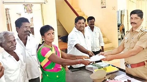 Panankatteri ward 8 contestant Vijaya petitions police over her family being ostracised in Ambur on Tuesday