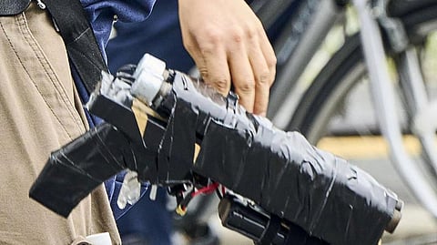Suspect Tetsuya Yamagami holds a weapon