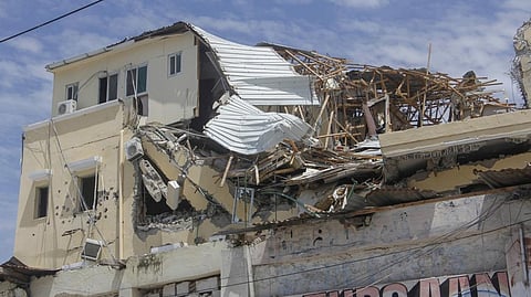 Damage is seen on top of the Hotel