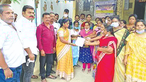 Teachers of the government GHSS in Gudiyattam handing over the petition to the MLA.
